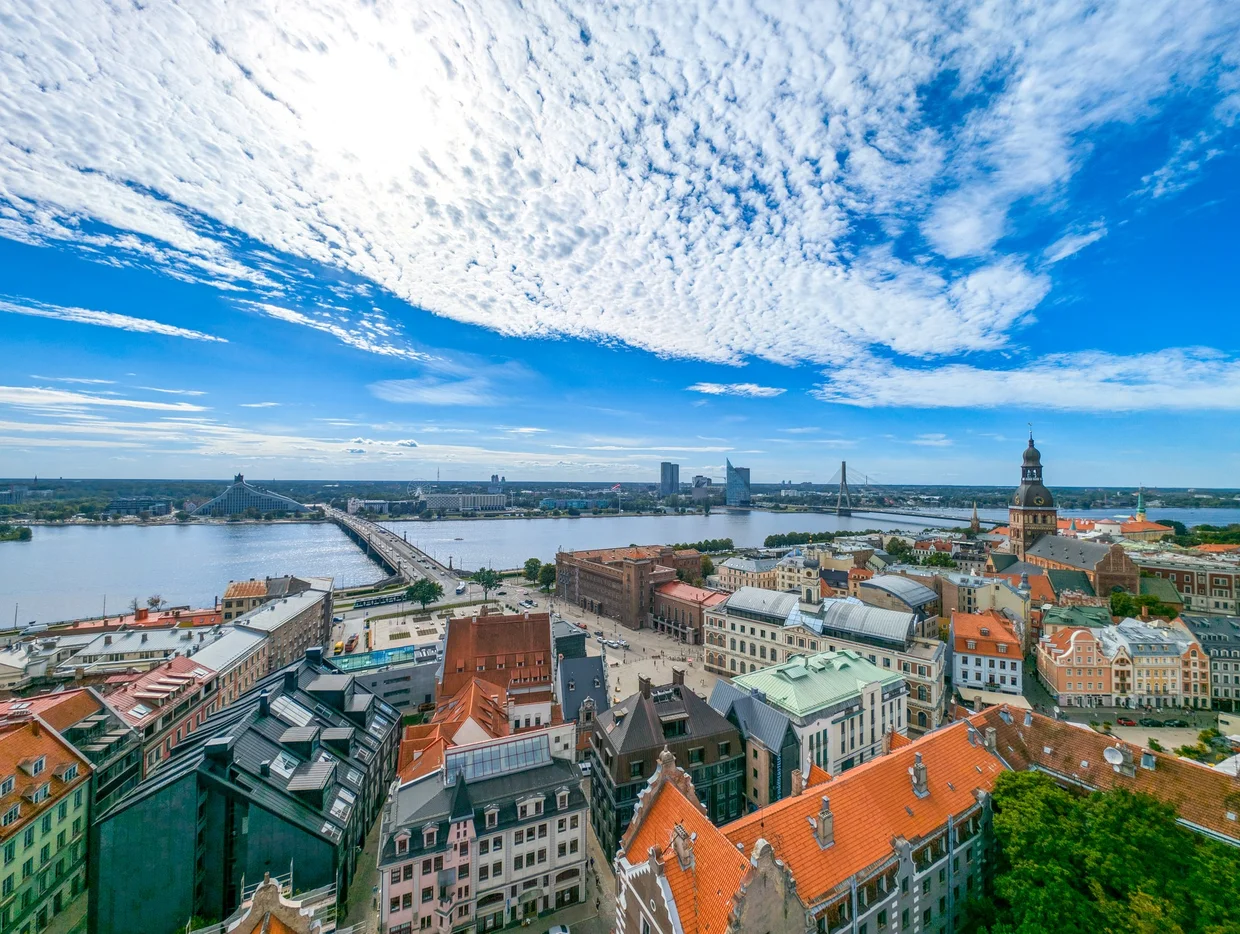 The Daugava river winding past Riga Old Town, seen from St. Peter's tower