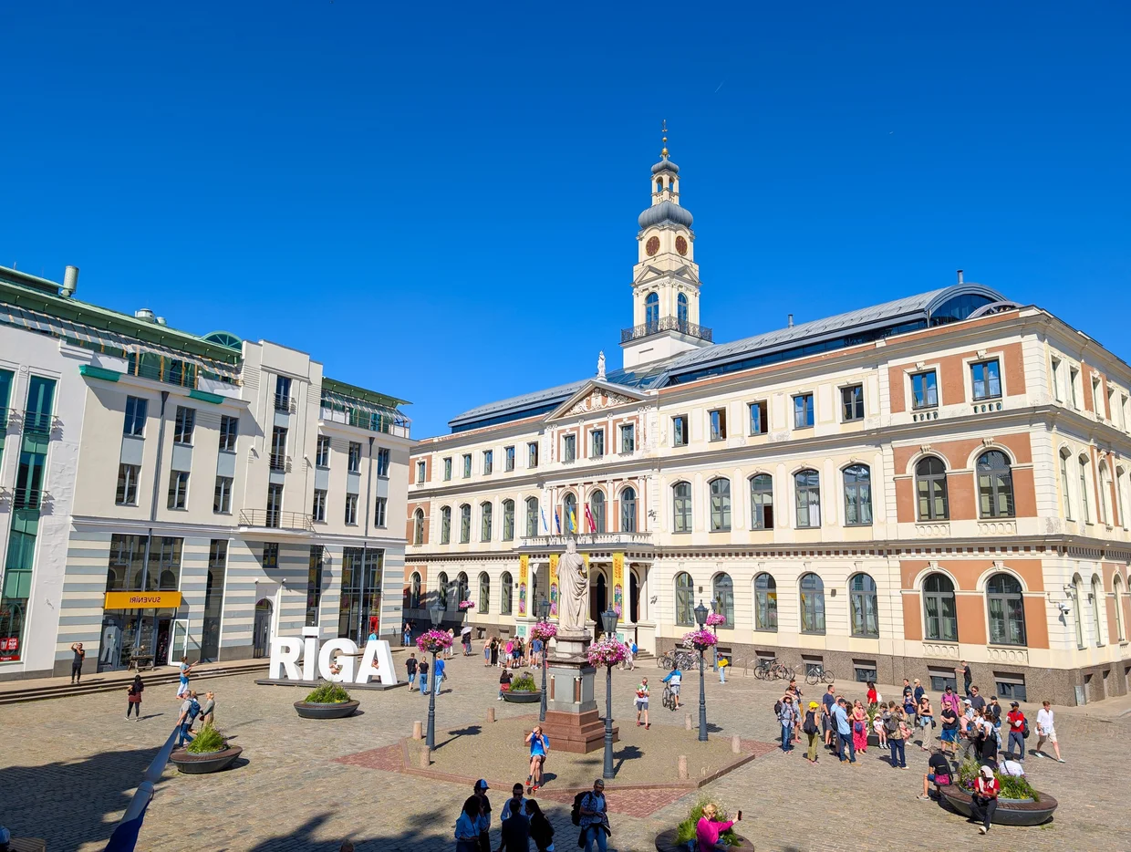 Town Hall Square in Riga with the big RIGA sign and the Town Hall tower