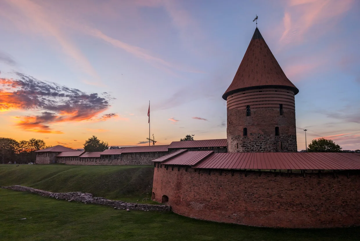 Kaunas Castle at sunset with pink sky