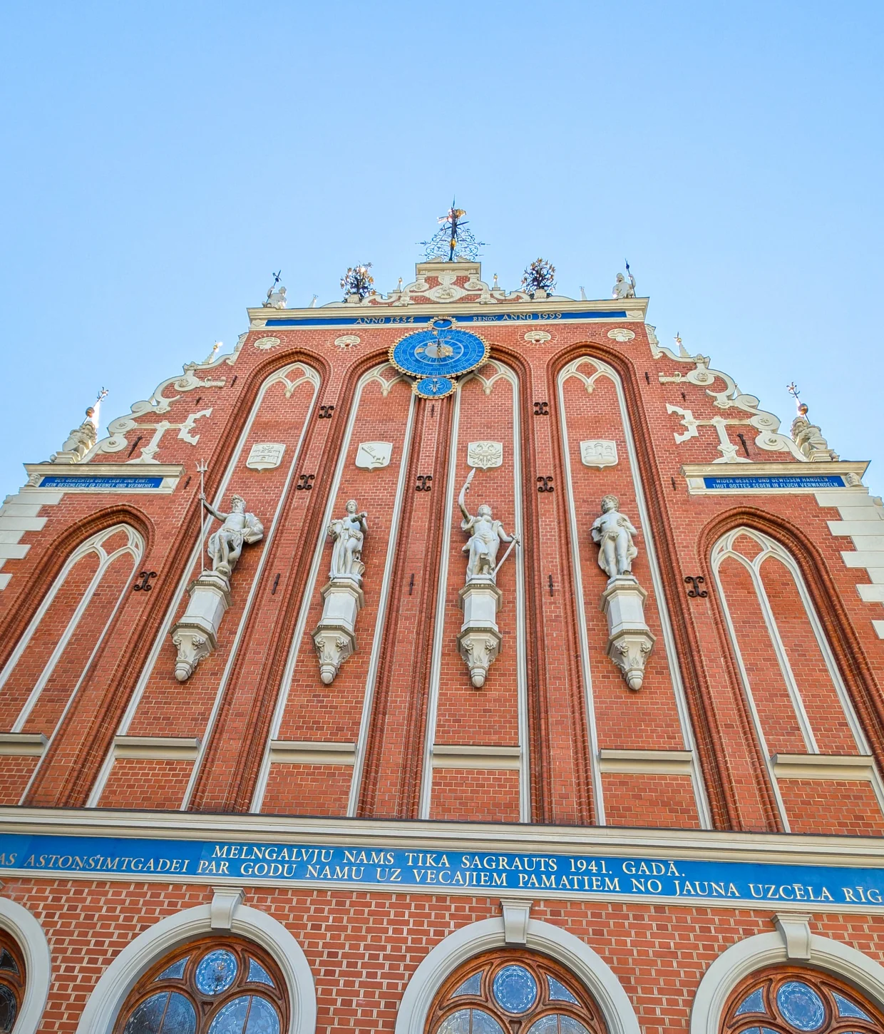 The ornate red brick facade of the House of the Blackheads in Riga