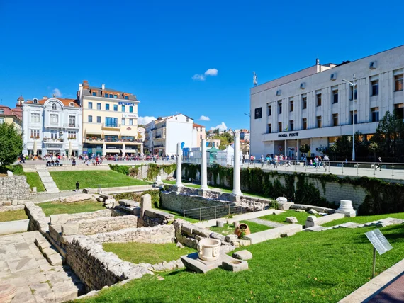 Roman Forum ruins surrounded by modern Plovdiv