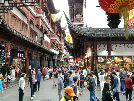 Crowded traditional shopping street in Shanghai's Yu Garden area