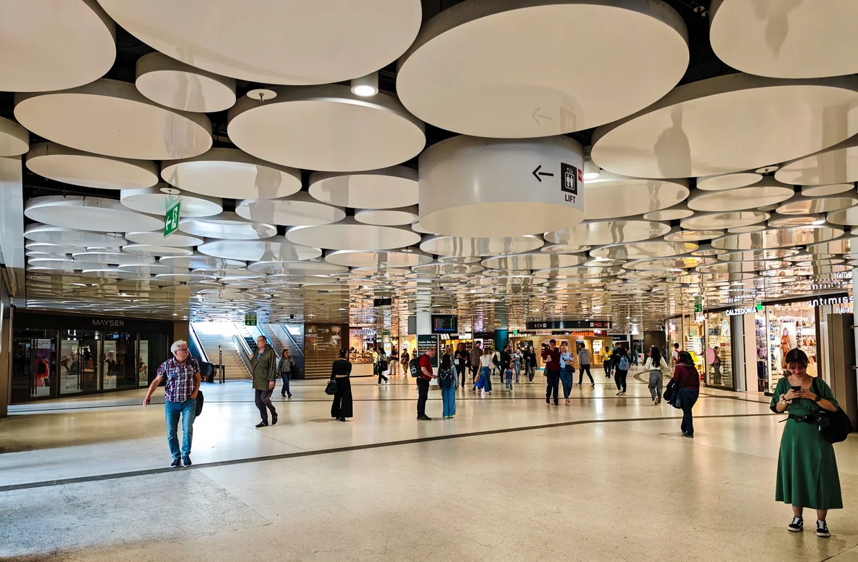 Underground concourse below Stachus with circular ceiling lights