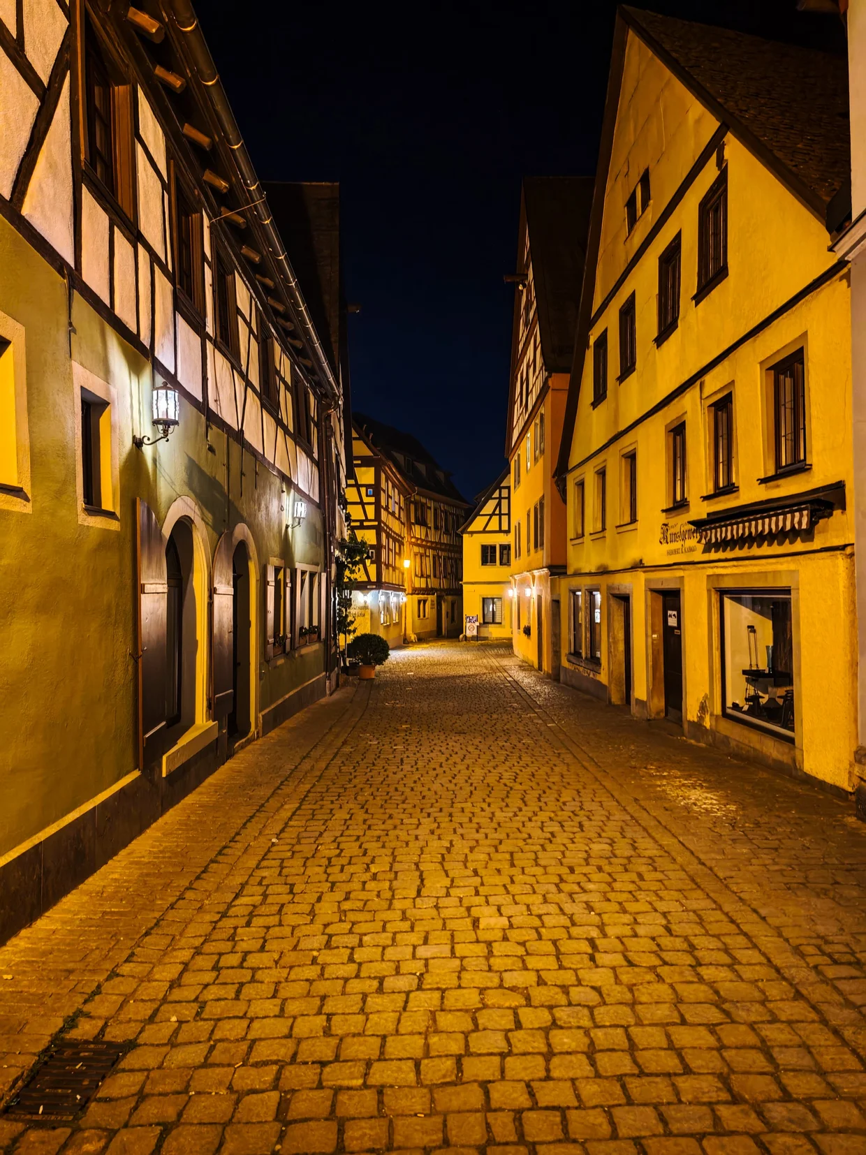 Empty Rothenburg cobblestone street at night, a long weekend, around 22:00