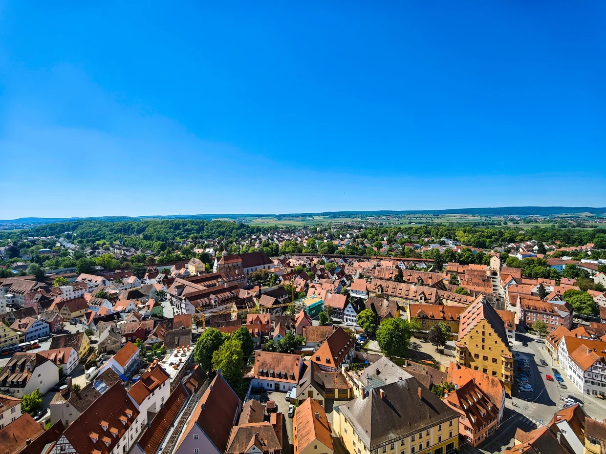 Aerial of dense red tile roofs and gable houses