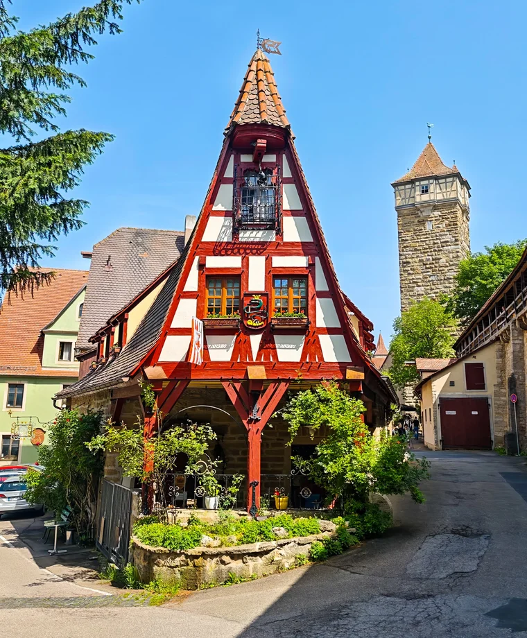 Gerlachschmiede half-timbered forge with Roderturm behind, Rothenburg ob der Tauber