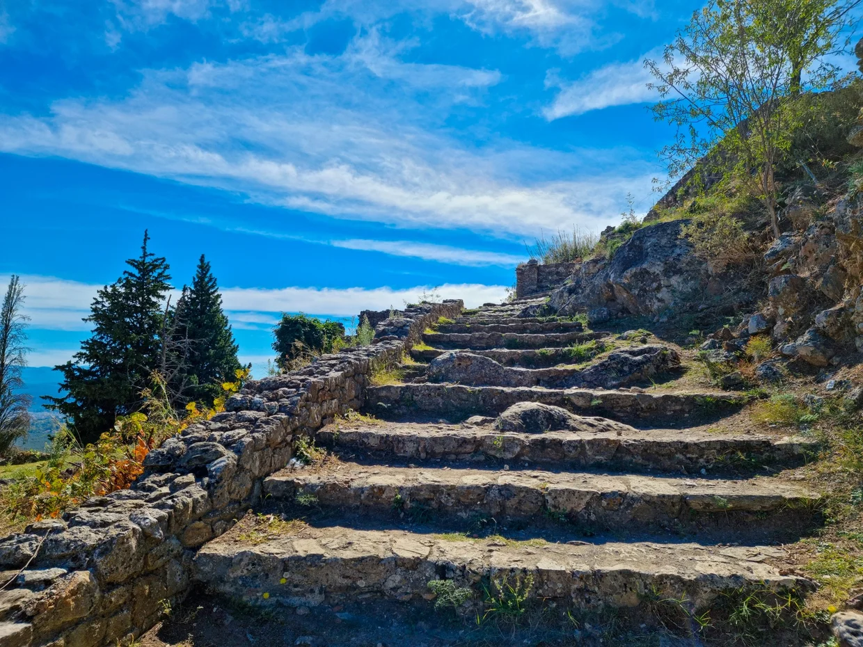 Stone steps climbing upward through Mystras