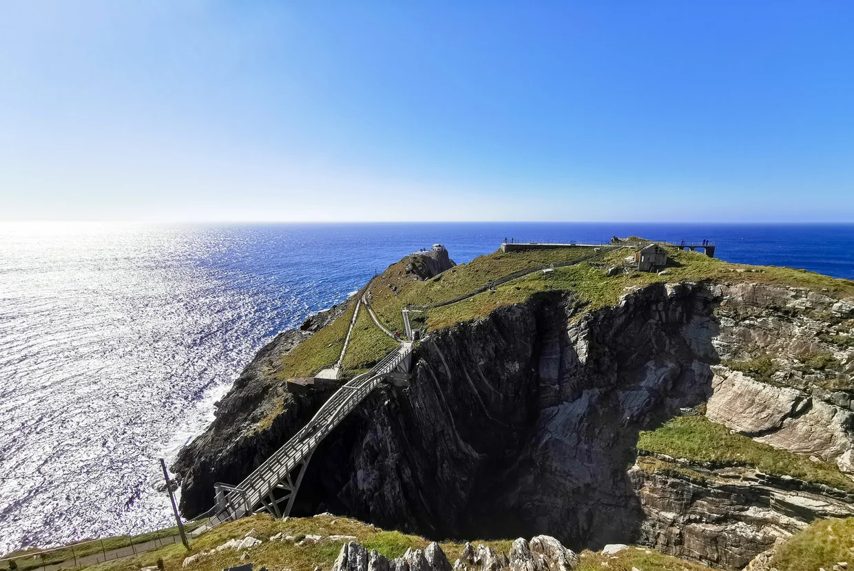 Mizen Head signal station on a clifftop with bridge over a sea gorge