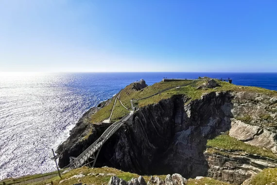 Mizen Head signal station on a clifftop with bridge over a sea gorge