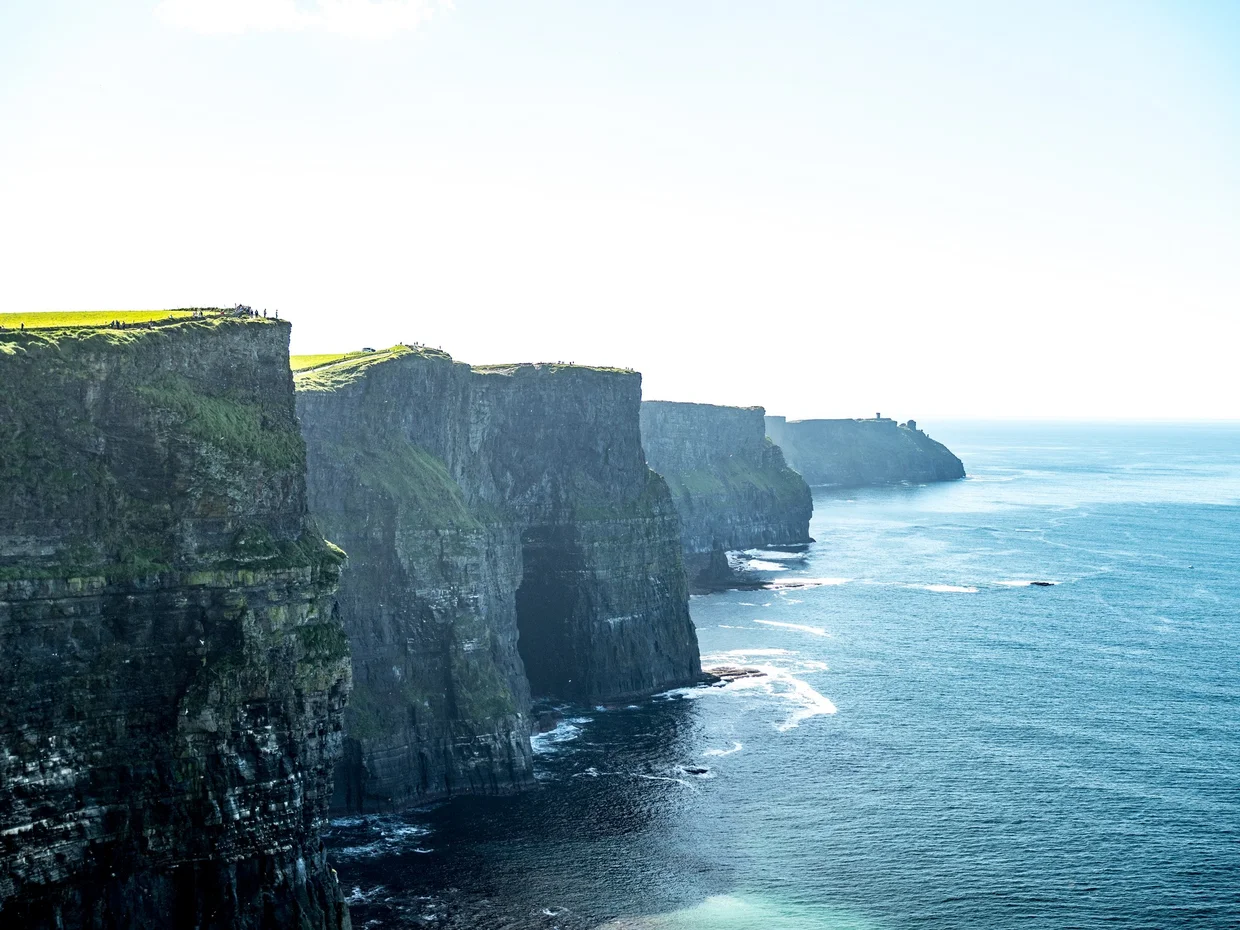 Cliffs of Moher panoramic view, green clifftops dropping into the Atlantic