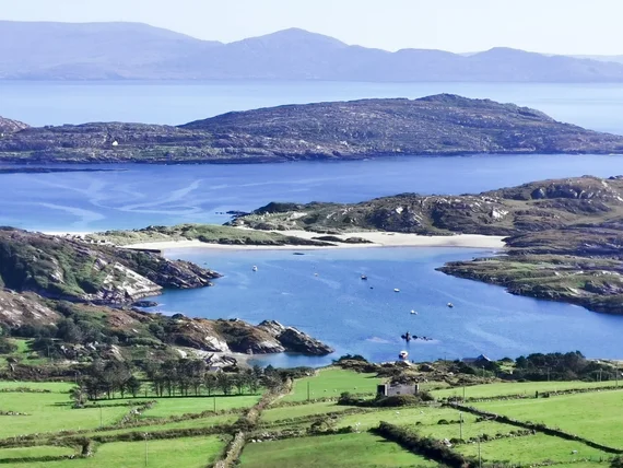 Derrynane Bay with white sand beach and sheltered harbour from above