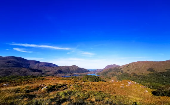 Mountain valley with lake nestled between the peaks