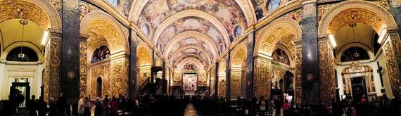 Full panoramic interior showing the entire nave and gilded walls