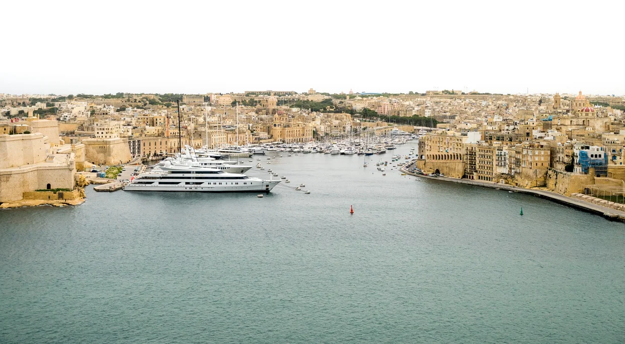 Superyachts moored at the Three Cities marina