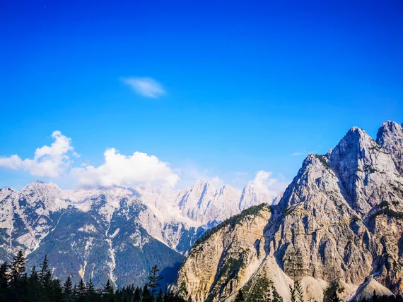 Mountain panorama with jagged ridge and snowy peaks