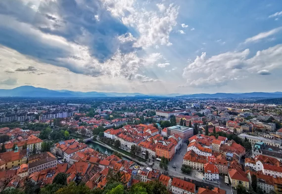 Ljubljana skyline under moody clouds