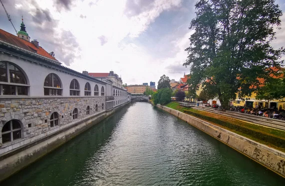 Canal view along the Plečnik market arcades in Ljubljana