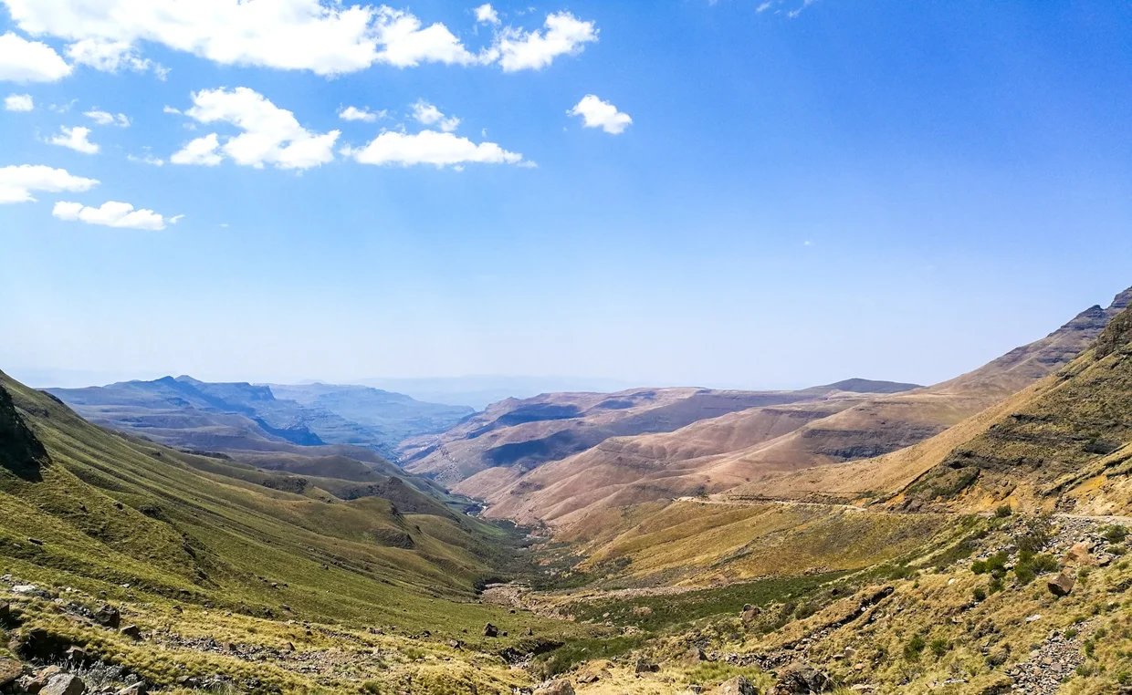 View from the summit looking down the Sani Pass valley into the Drakensberg