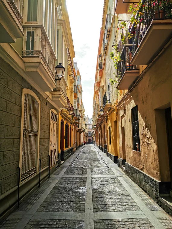 Narrow cobblestone alley in Cádiz old town
