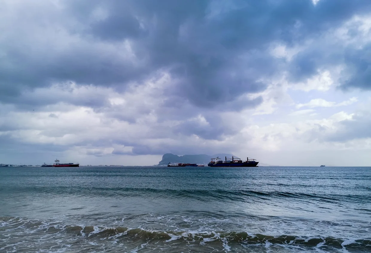 View toward the Rock of Gibraltar with cargo ships