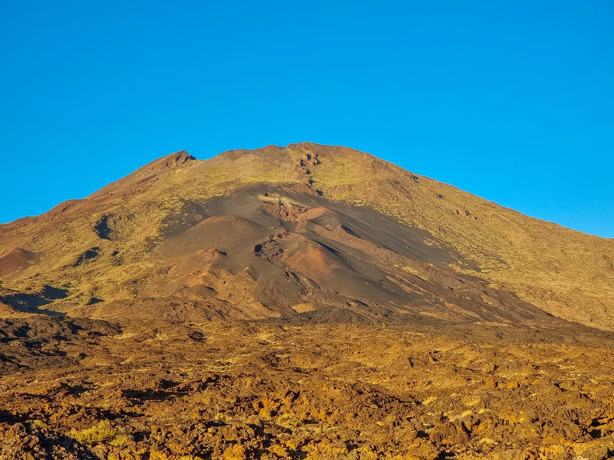Teide at sunset, golden light on ancient lava