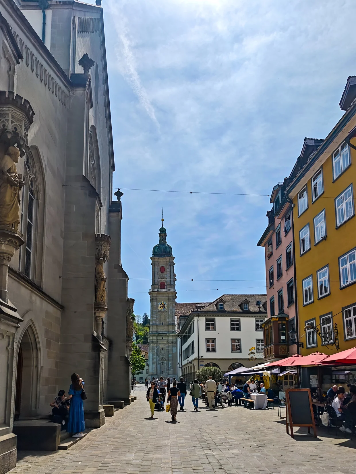 Looking down a St. Gallen old town street toward the cathedral towers