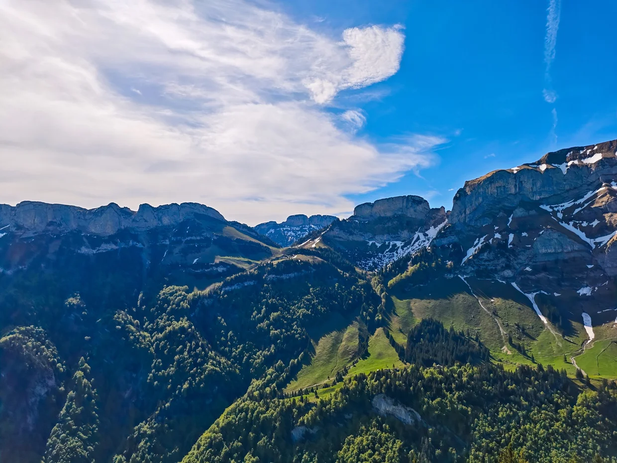 The Alpstein limestone walls in early morning light, ridge upon ridge