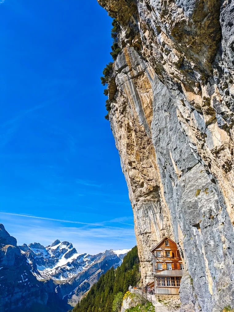 Berggasthaus Aescher tucked under the cliff face above Wasserauen