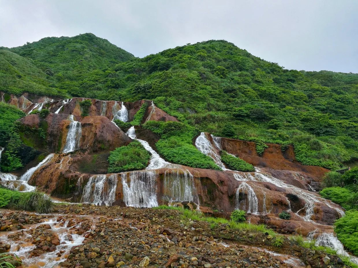 The Gold Waterfall near Jinguashi, stained orange-red by mineral runoff