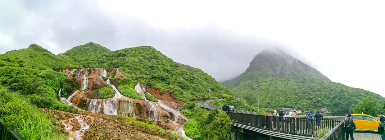 A wider view of the Gold Waterfall and the coast
