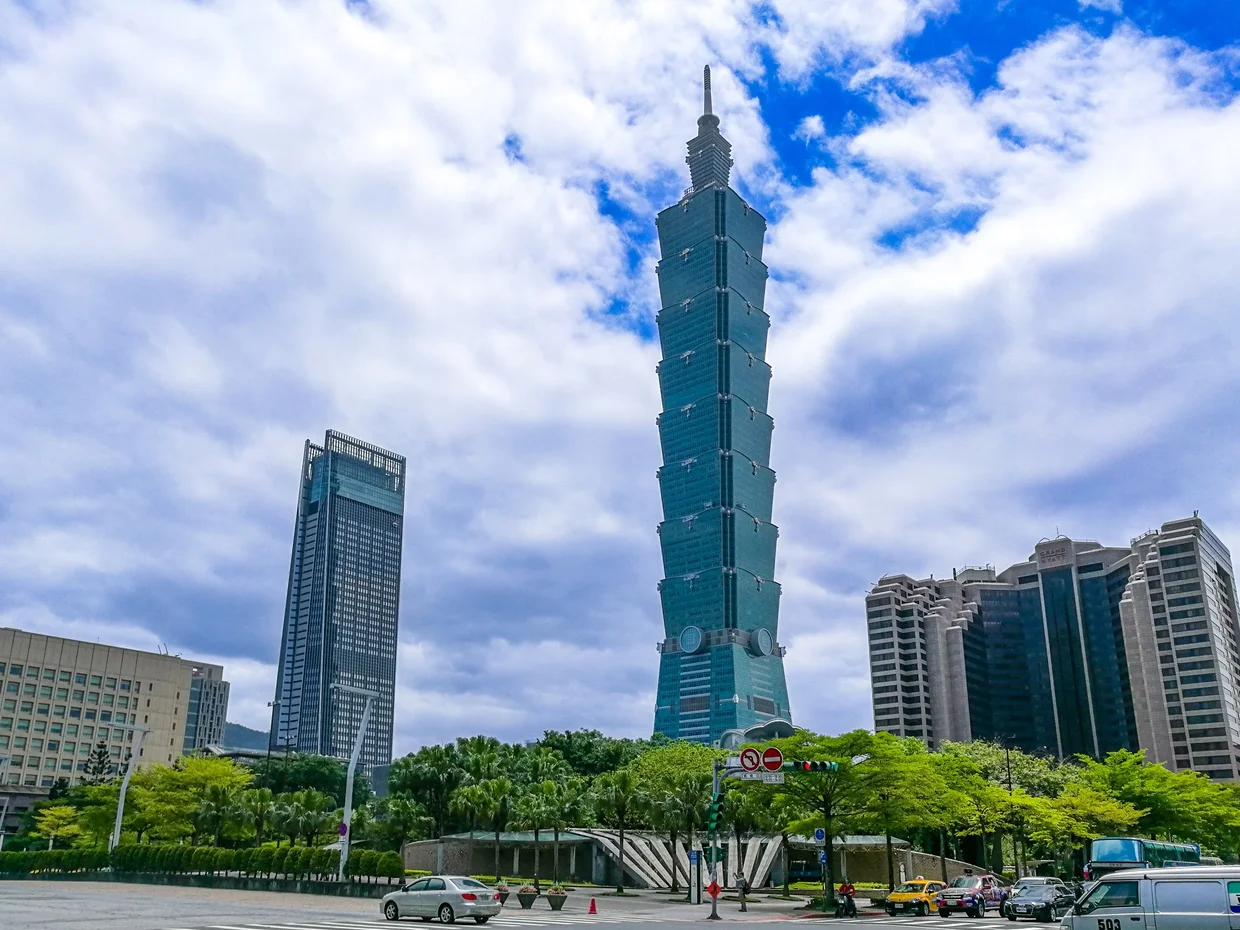 Taipei 101 rising above the Xinyi district in daylight