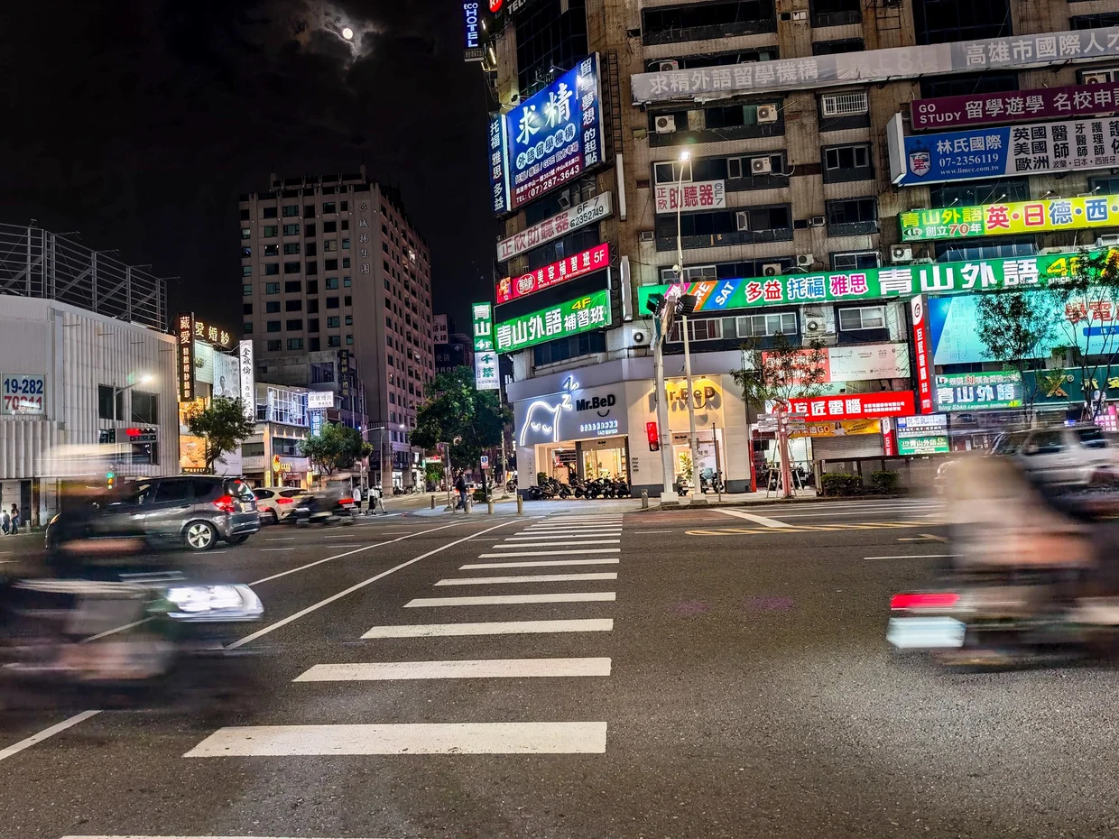 Scooter traffic streaming through the intersection