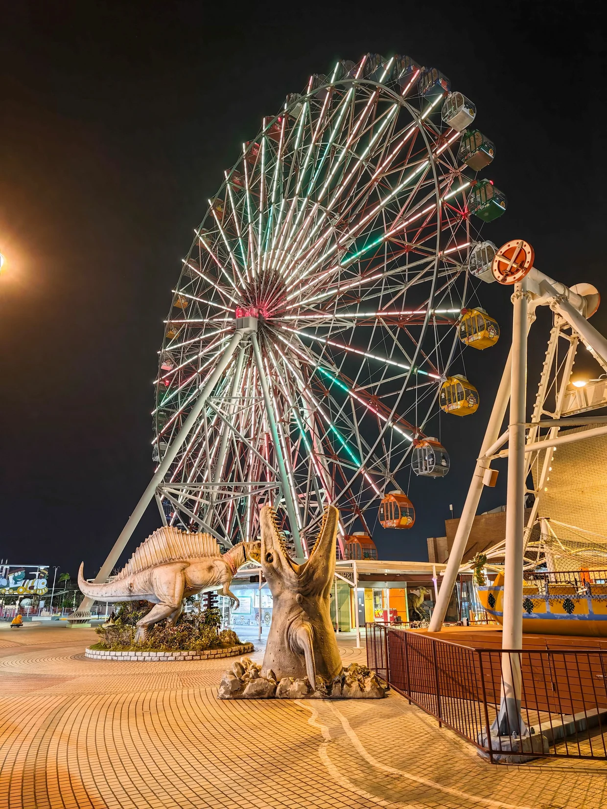 The Dream Mall Ferris wheel and its dinosaur friends