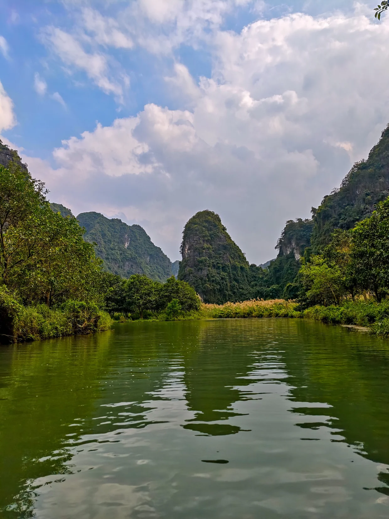 Trang An river winding through karst mountains in Ninh Binh