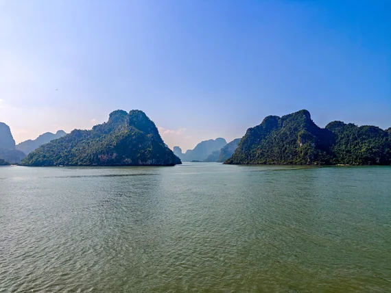 Limestone karsts rising from the water in Ha Long Bay