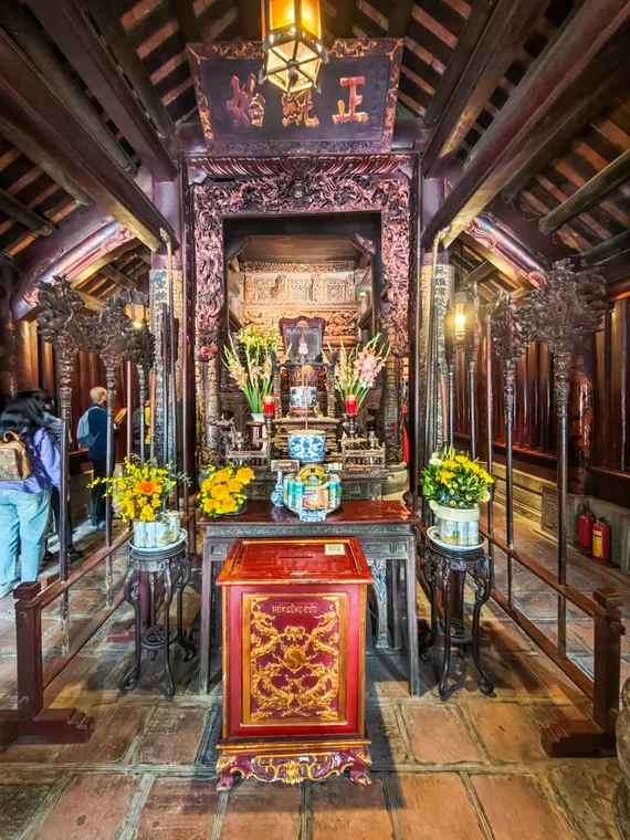 Ornate wooden altar hall inside a Hoa Lu temple